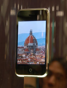 The iPhone, inside a spinning glass case.